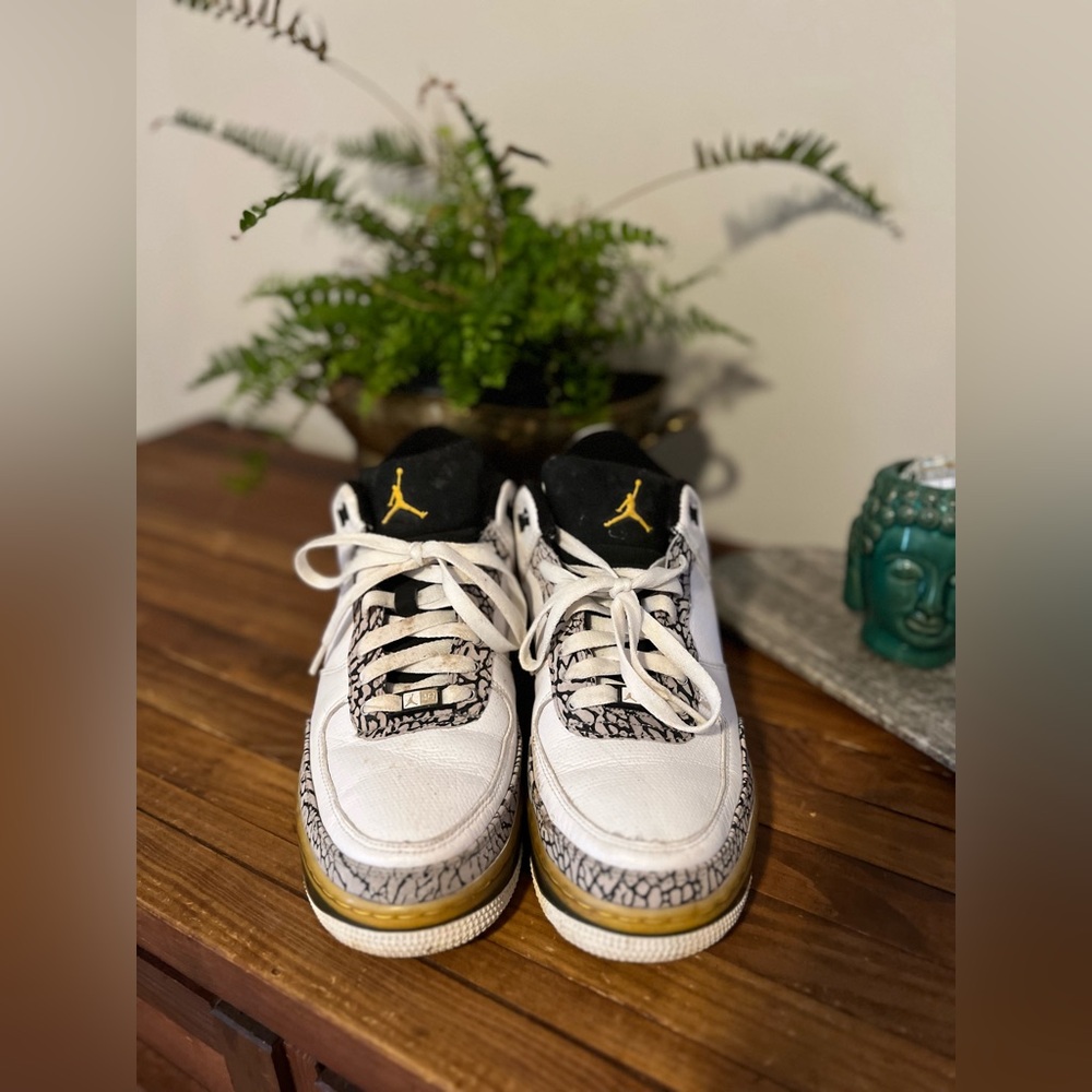 Nike Jordan White and Gold Sneakers with Black Accents